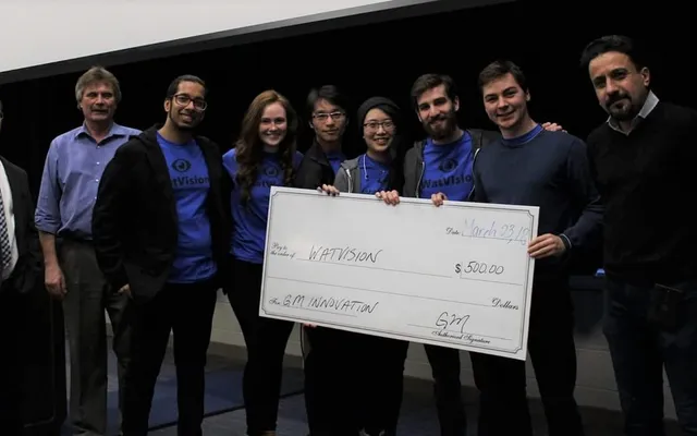 Craig and the WatVision team receiving the James Dyson Award