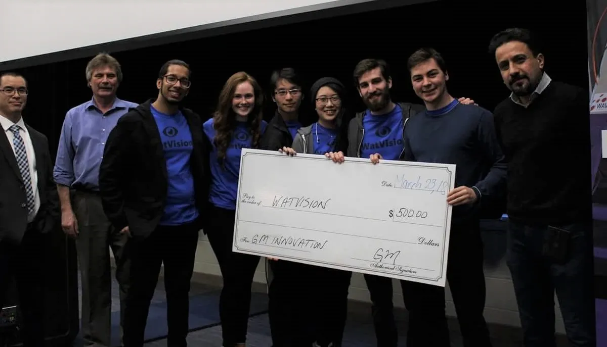 Craig and the WatVision team receiving the James Dyson Award