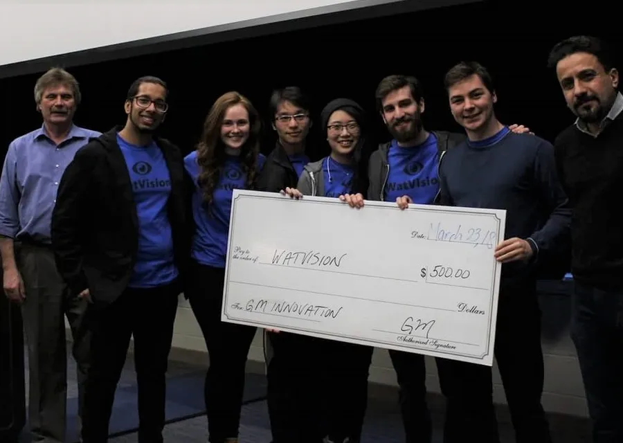 Craig and the WatVision team receiving the James Dyson Award